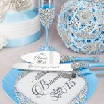 Light blue quinceañera cake cutting set with personalized names and dates